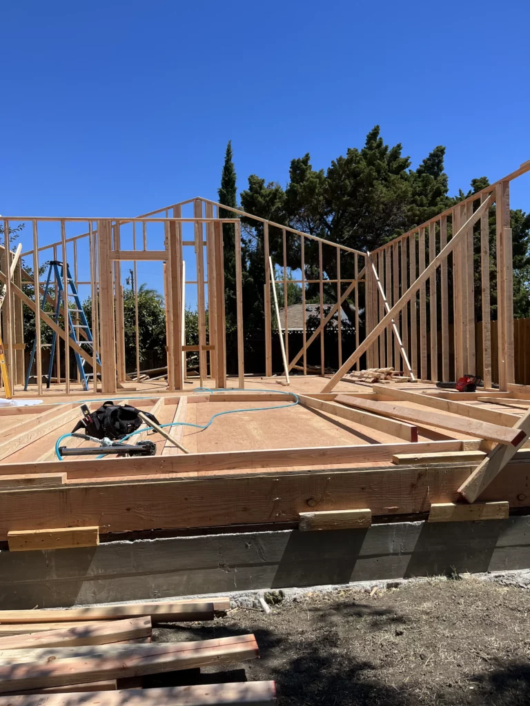 A house being built with wood framing.